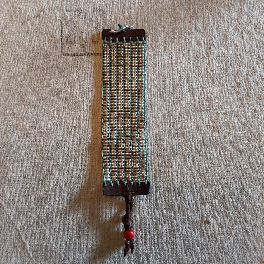 Fossil leather bracelet with silver twig and old red bead toggle clasp